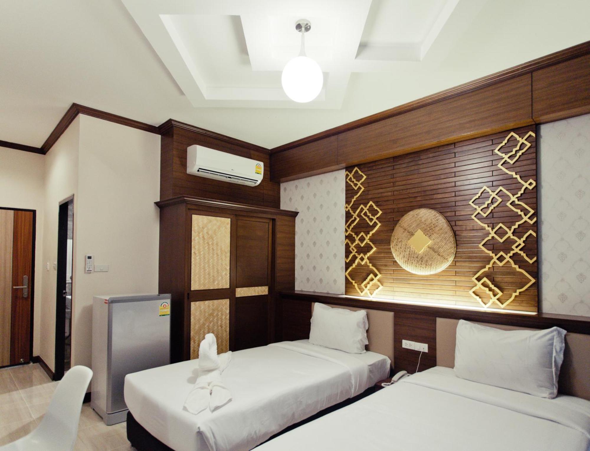 The Proud Hotel Ubon Ratchathani Quarto foto